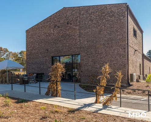 exterior metal buildings customizations like brick or stone