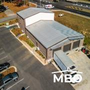 the food co-op in Georgia with brick exterior customizations added to the exterior metal panels