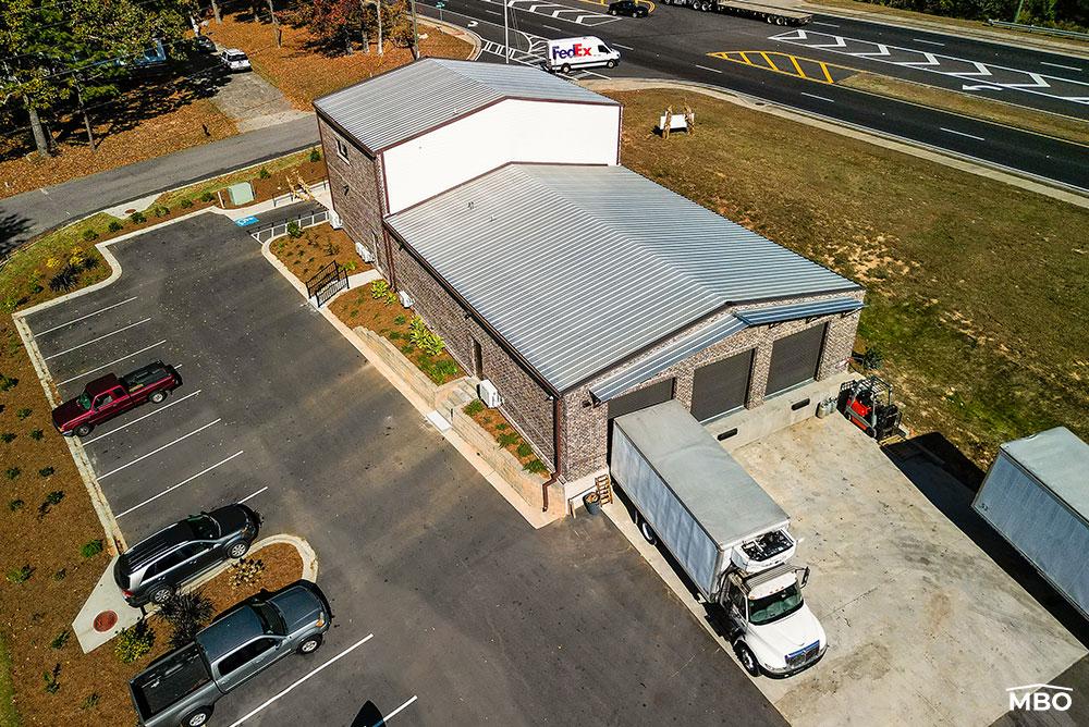 commercial-building-georgia the food co-op in Georgia with brick exterior customizations added to the exterior metal panels