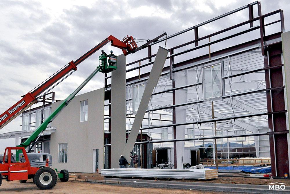 Insulated Panels Being Installed Panel Installation