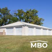 an open wall church that used roll doors