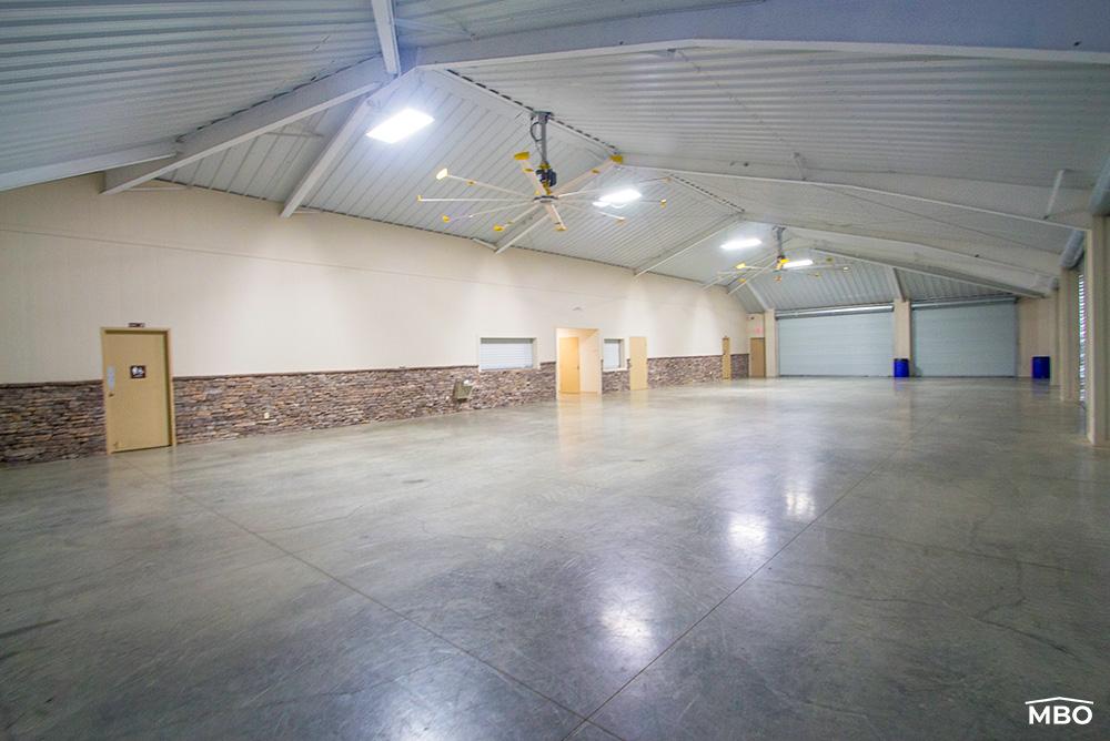 steel-building-hip-roof another view of the church interior with the roll doors down