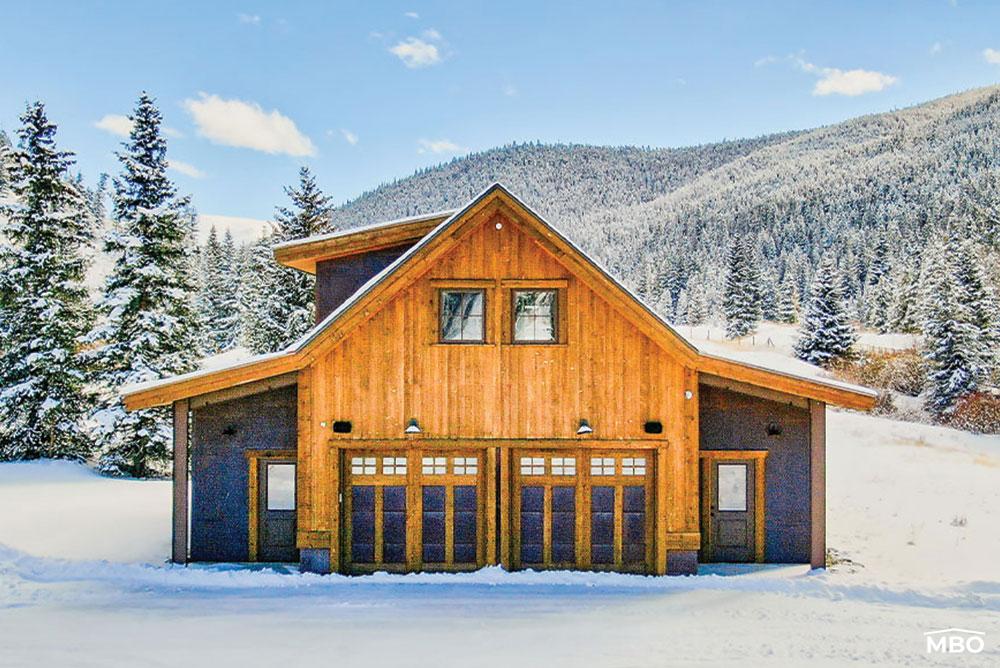 Steel-Barndominium-Kits Barndominium with Wood Siding in Snowy Scenery